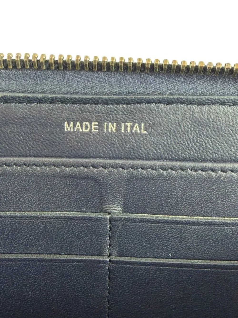 CHANEL Authentic Chevron and Diamond Quilted Navy Blue Leather Zippy Wallet